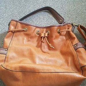Leather drawstring bucket purse.